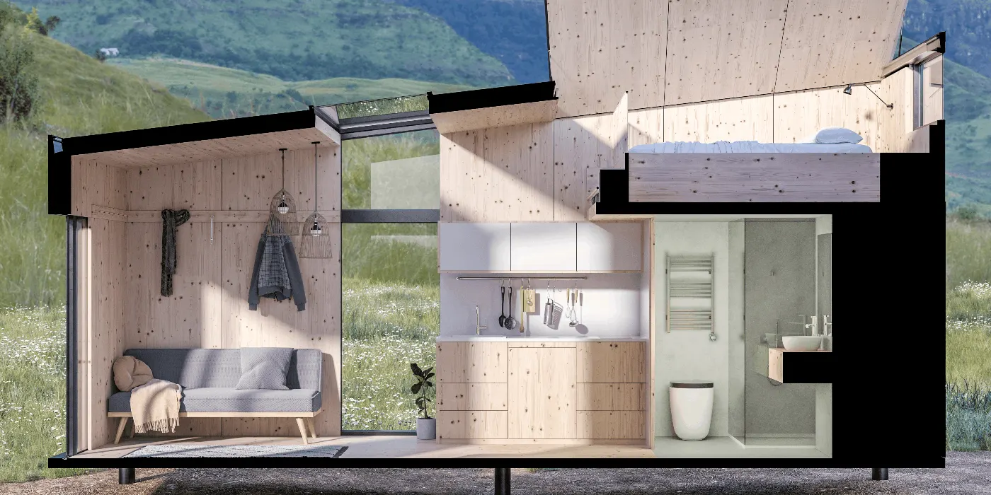 Module Hoummi en coupe, face à la montagne : séjour, cuisine, salle d'eau et chambre en mezzanine